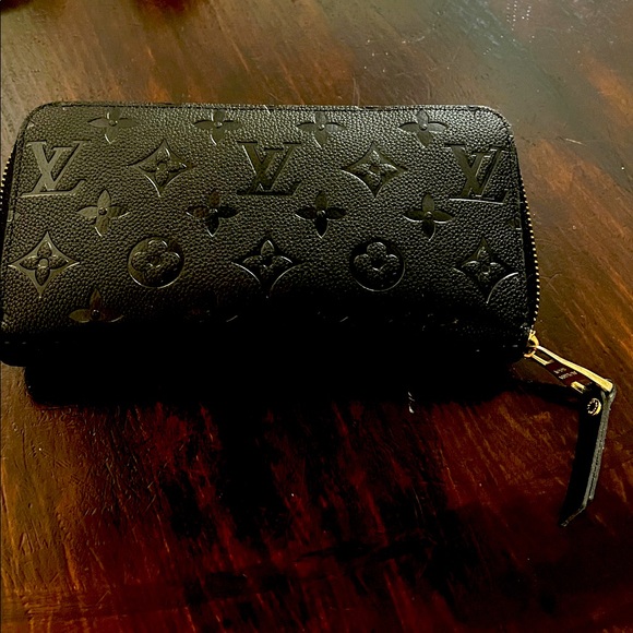 fashion wa Handbags - Like NEW Black Embossed Monogram Fashion Wallet.